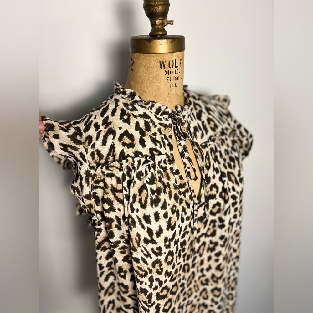 J. Crew animal
Print blouse with tiny ruffle sleeves size small